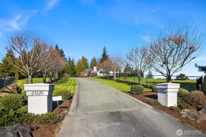 The property is just off of a culdesac in the Uplands neighborhood and accessed over a private driveway.