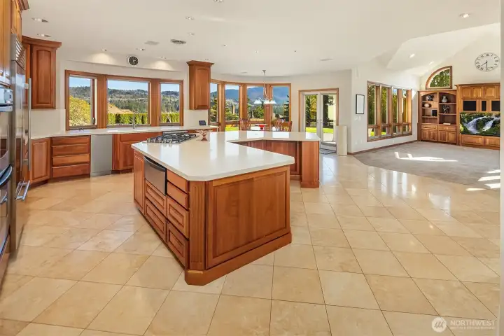 The kitchen, eating space and family room together makeup a fabulous great room! Sweeping views throughout!