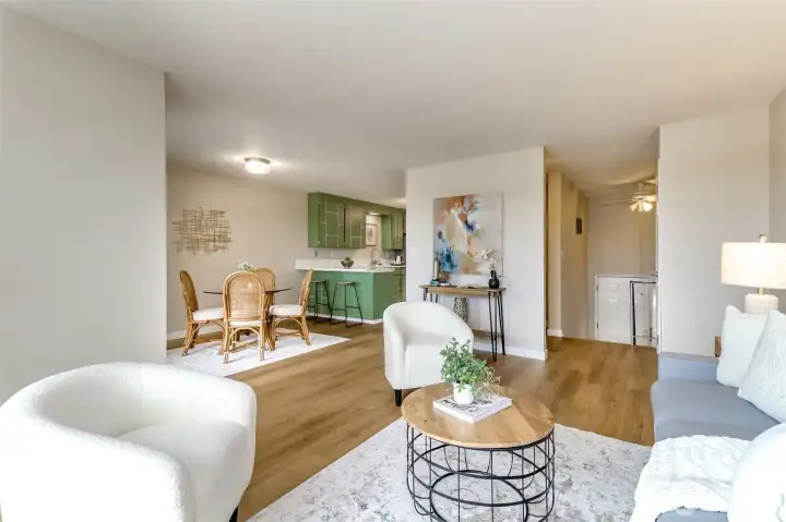 This angle shows the stairs, dining room and kitchen.