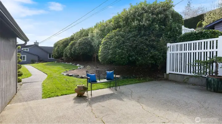 Patio located between the garage and shed