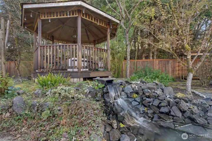 Covered pergola for quiet mornings with your coffee.