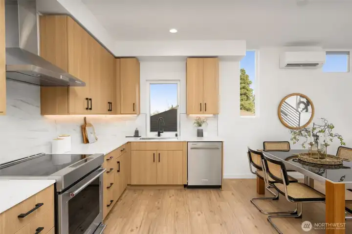 Close-up of the high-end kitchen finishes, highlighting stone countertops and elegant fixtures.