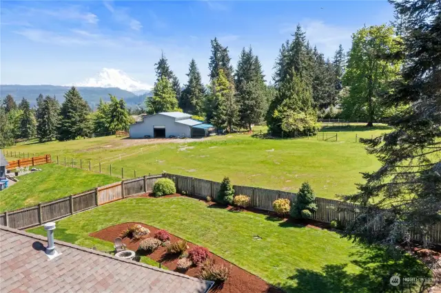 Soak in the stunning mountain view from the fully fenced back yard in this peaceful neighborhood.