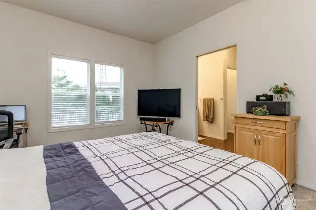 Primary bedroom with walk in closet and en -suite bathroom