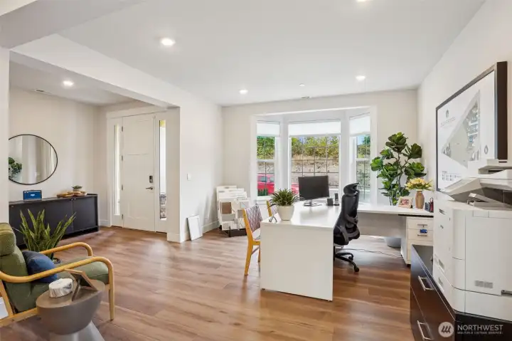 This is actually the formal living room, currently being used as a temporary sales office.