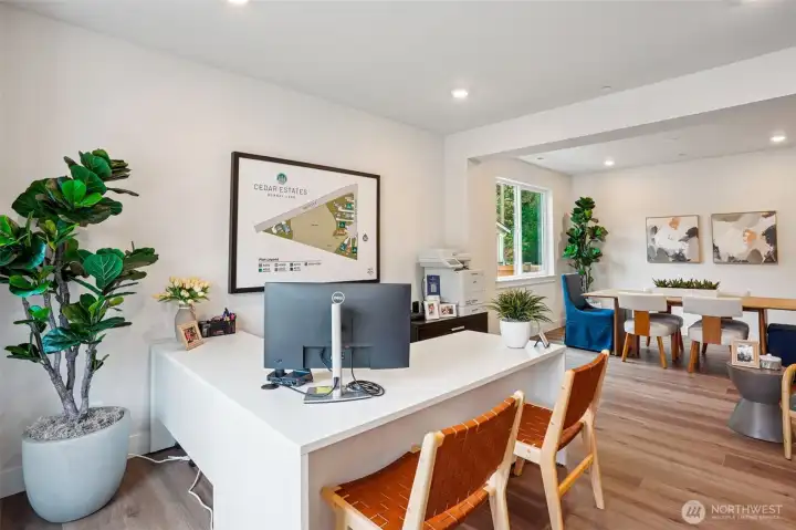 Formal living room area off of entry, currently being used as a temporary sales office