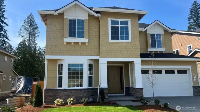 The 4070 plan is Ba beautiful Craftsman style home that is 3407 sqft. 4-bdrm plus one bdrm on main floor PLUS a large bonus/rec room that also has a closet and could be the 5th bdrm.