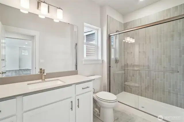 Bath on main with shower.