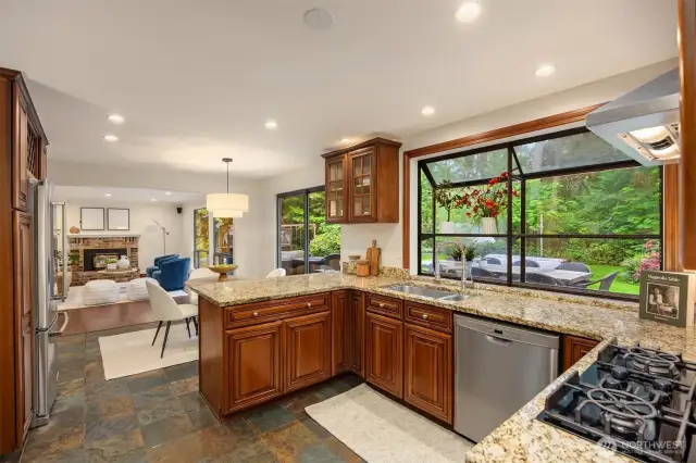 Open kitchen adjoins the family room/den.