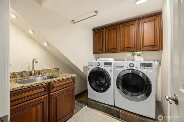 Laundry room with sink.