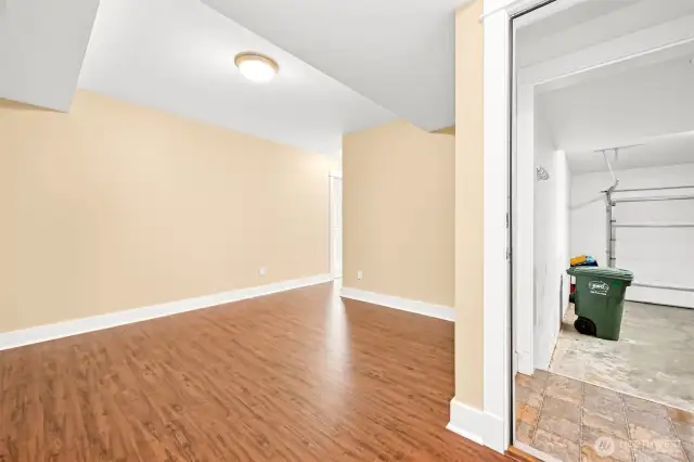 family room downstairs with access to garage