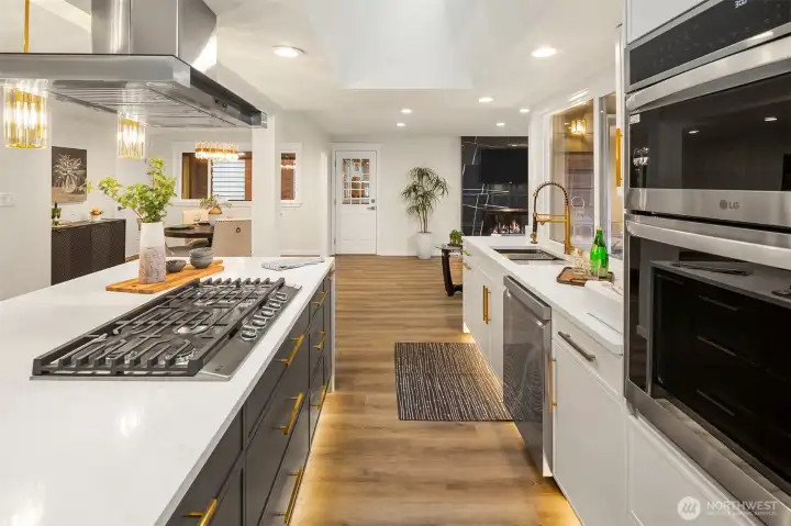 That's an LG Microwave Oven Combo on the right and  Hummer of a hood over the stove - quick cooking is a clean, fresh joy here!