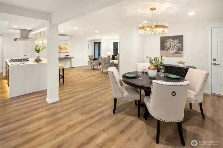 Notice the lovely crystal glass on gold light fixtures - the perfect compliment to the white on white interior!