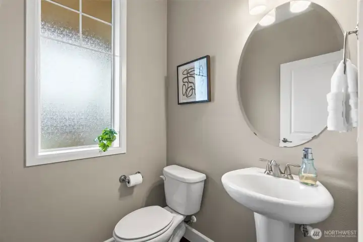 Guest powder room on main floor.