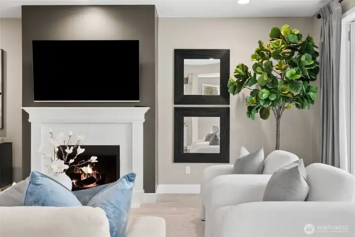 Accent fireplace wall color is consistent through the home tying in the color scheme.