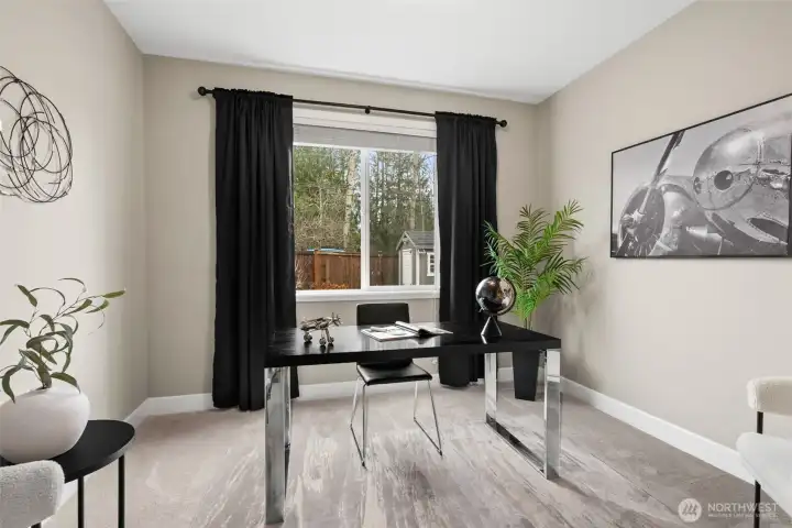 Jr. Suite on the main floor.  With attached full bath, this space is perfect for a guest suite, multi-generational living or a home office.