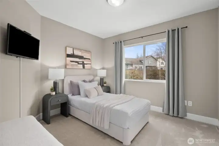 Bedroom 2 on 2nd floor.  Also includes walk in closet + more custom closet organizers.