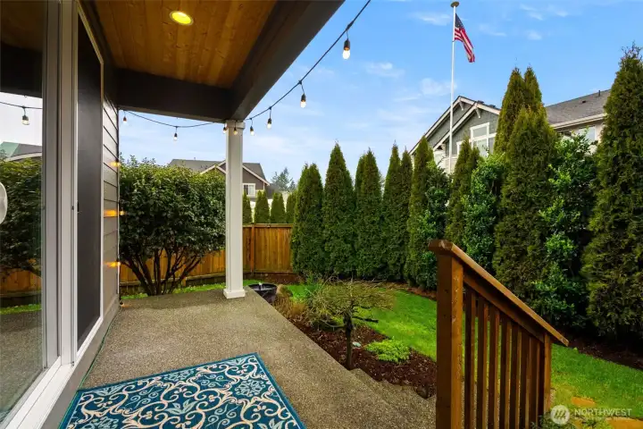 Back yard patio is covered and cozy.