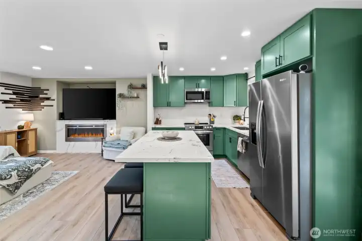 Open concept where the living room, dining room and kitchen all flow seamlessly together!