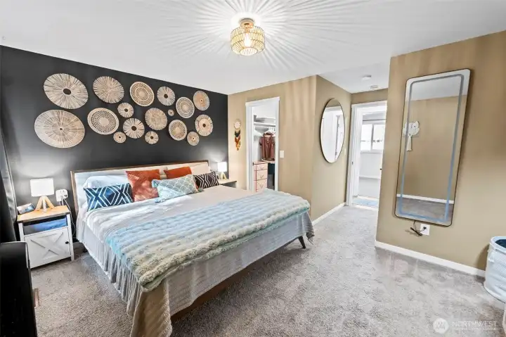 Lots of room for a large bed, side tables, dresser, and more.