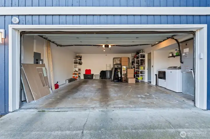 Large 2-car garage, with additional parking in the driveway.