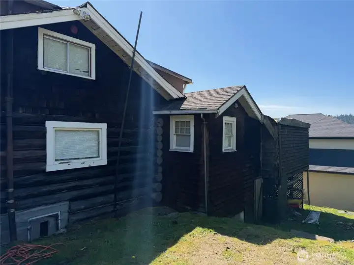 Right elevation from left, the kitchen, bathroom, and main bedroom.