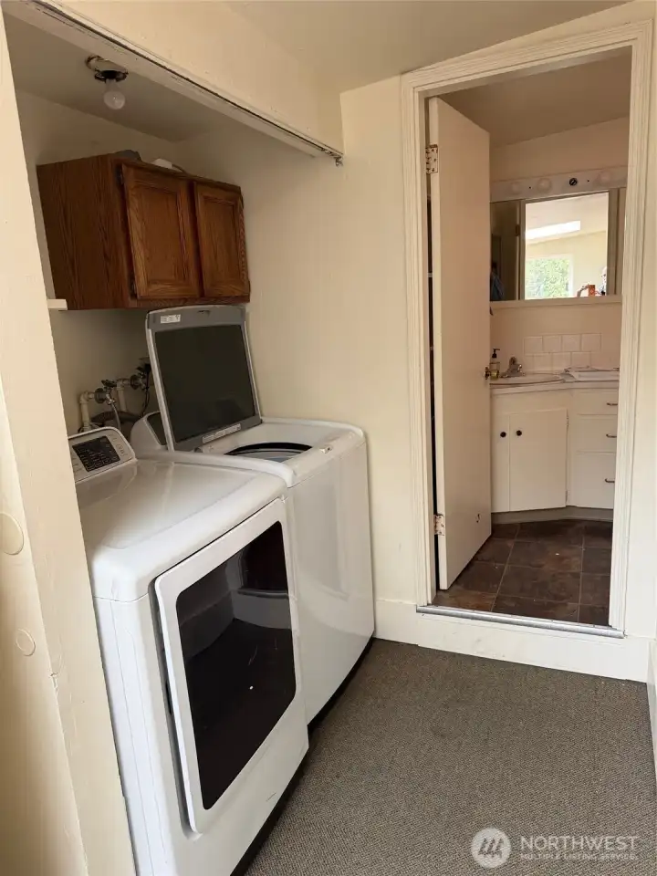 Utility area, bathroom at end of hallway.