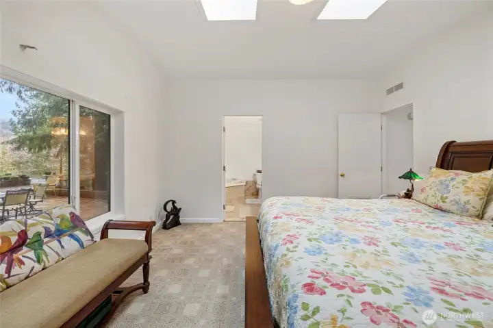 Primary bedroom facing the en-suite bathroom