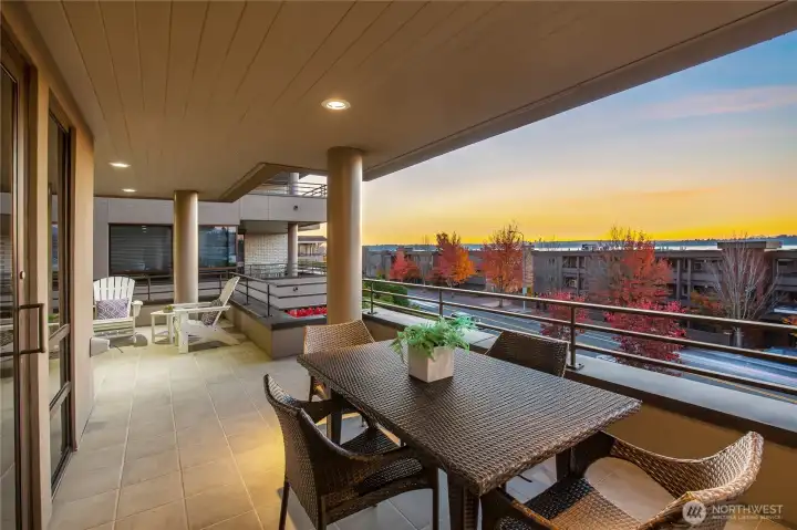 The one you have been waiting for! Unwind and take it all in with this beautifully updated, ground floor, lock-and-leave retreat showcasing stunning west-facing views of the lake, city skyline, and Olympic Mountains.