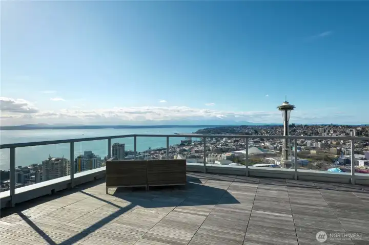 Spectacular rooftop views looking to the NW of the north tower with sunset views over the Olympic Mtn range, Sound & Space Needle!
