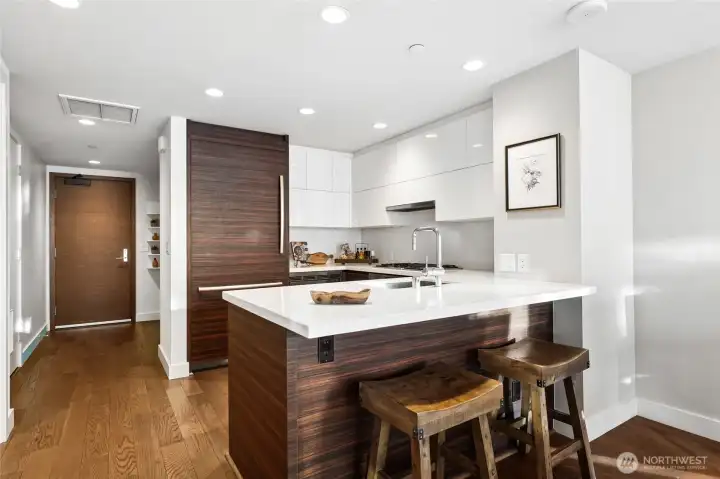 Beautiful kitchen with eating bar for casual meals.