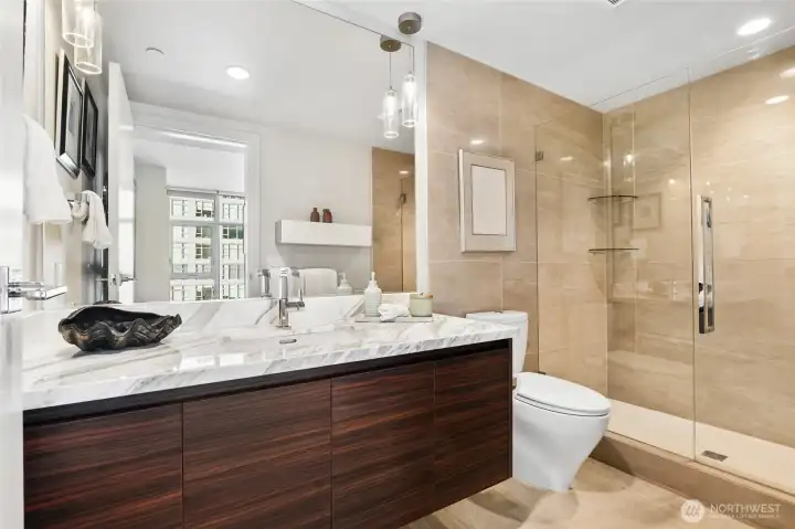 Primary bath with lovely, spacious shower.