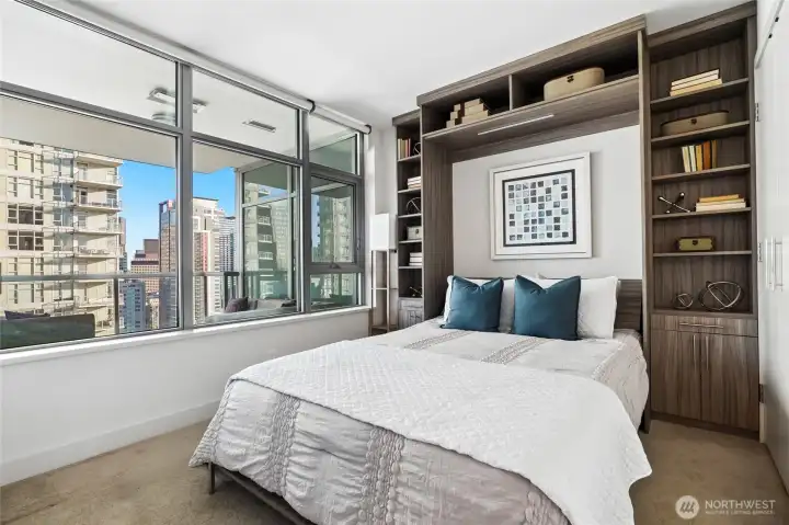 Wonderful guest suite with custom built-in Murphy Bed with additional shelving & storage, so cool!