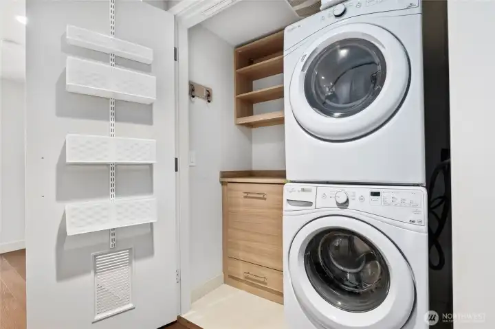 Check out the laundry closet with efficient storage.