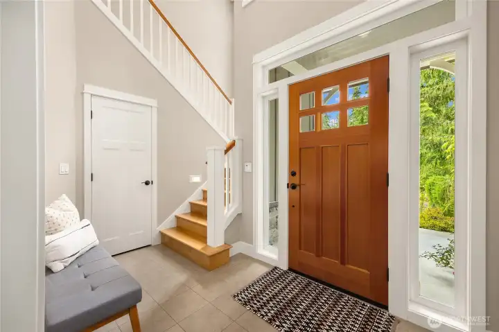 Featuring ceramic tile floors and a solid wood door, you notice the quality of construction immediately when entering.