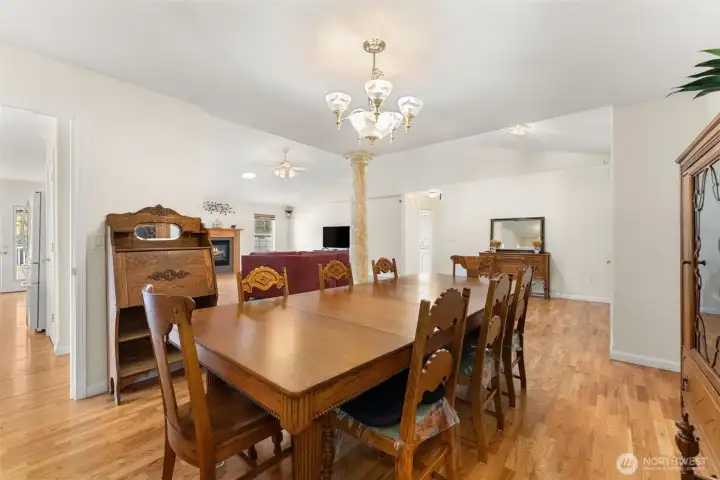 Dining area connects to the living room and kitchen, offering an open layout with a sense of separation