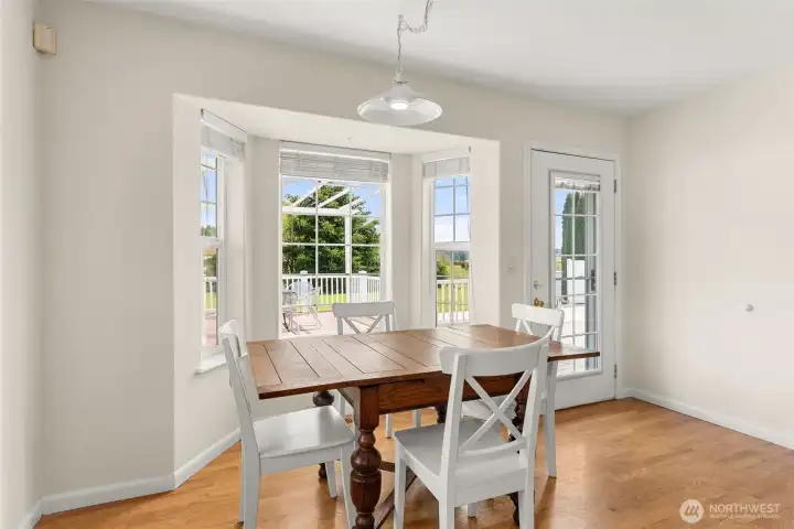 Inviting breakfast nook with outlook to the deck