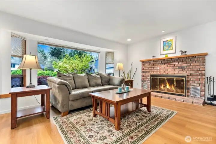 Another view of this charming living room area with fireplace