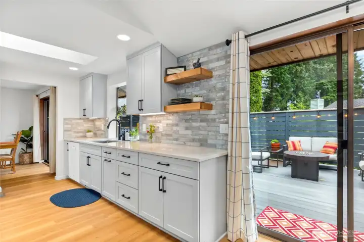 Open shelving compliments this beautiful kitchen