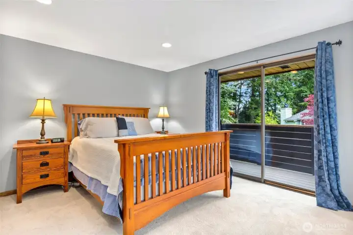Primary Bedroom upstairs with private deck.