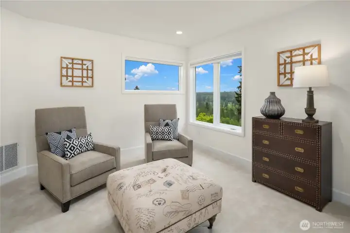 Confortable sitting area with additional mountain and valley views can also be used as an office space.
