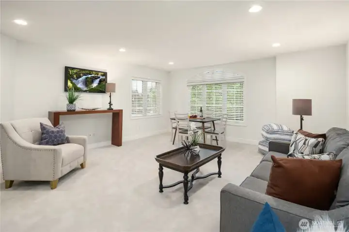 Another great flex space is found in this very large bonus room perfect for movie nights, games, or additional entertainment space.  Extensive ceiling lighting and two west facing windows brighten this special space.