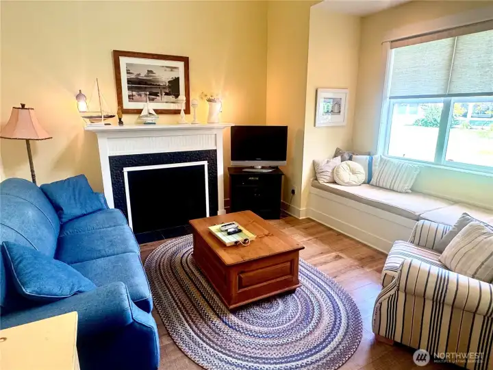 Great room with window seat overlooking the greenspace.