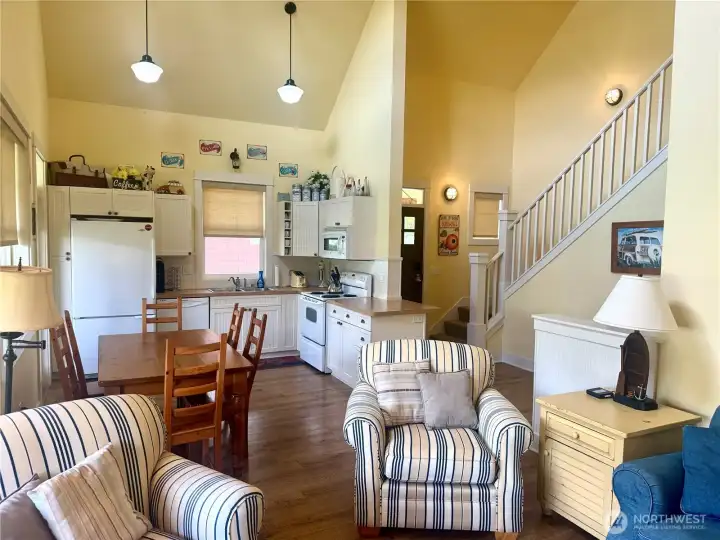 Great room offers soaring ceilings.