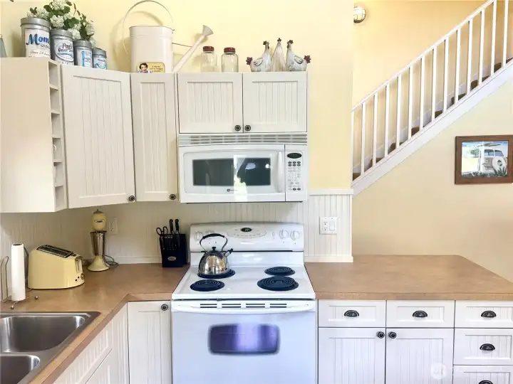 Kitchen is fully equipped for preparing homemade meals.
