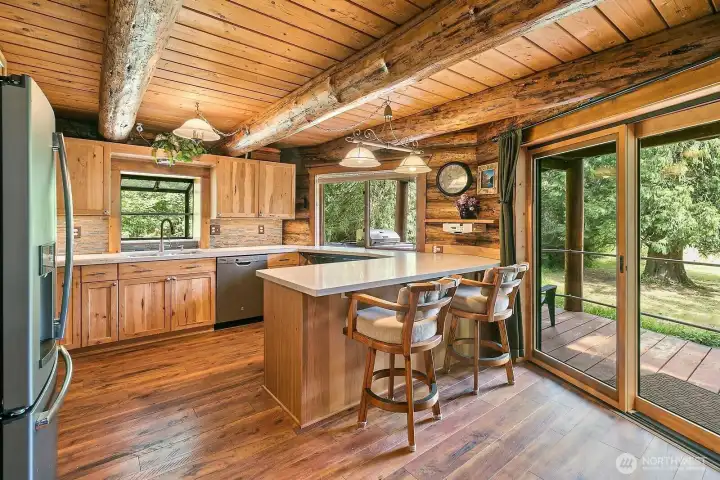 Kitchen with slider to deck. Kitchen with slider to deck.
