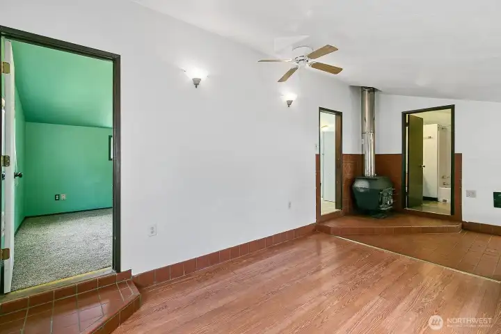 living room with main bedroom to the left. living room with main bedroom to the left.