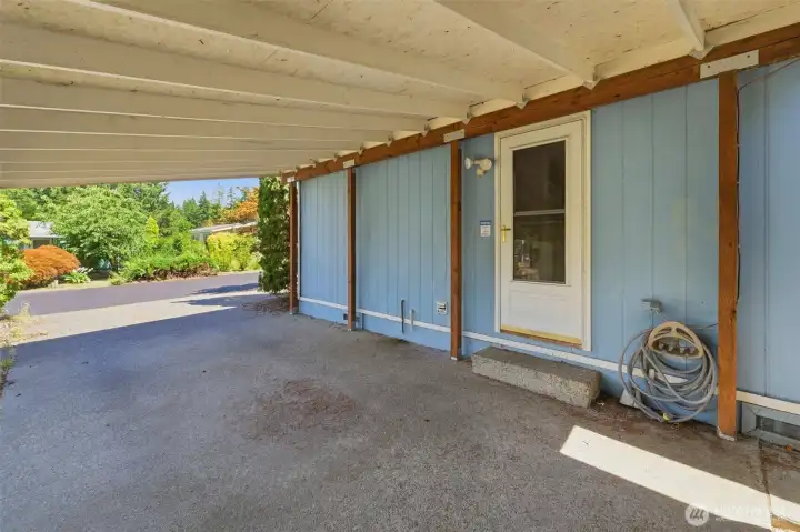 Carport with backdoor to kitchen