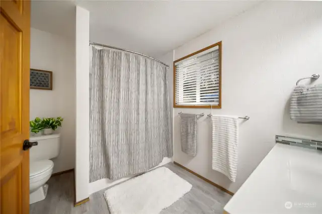 Bedrooms 2 and 3 both have the luxury of a large, fully renovated bathroom.