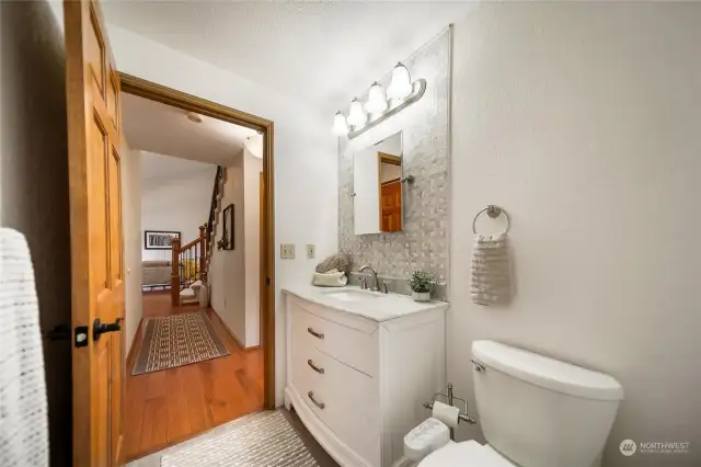 This updated main floor half bath will not disappoint!